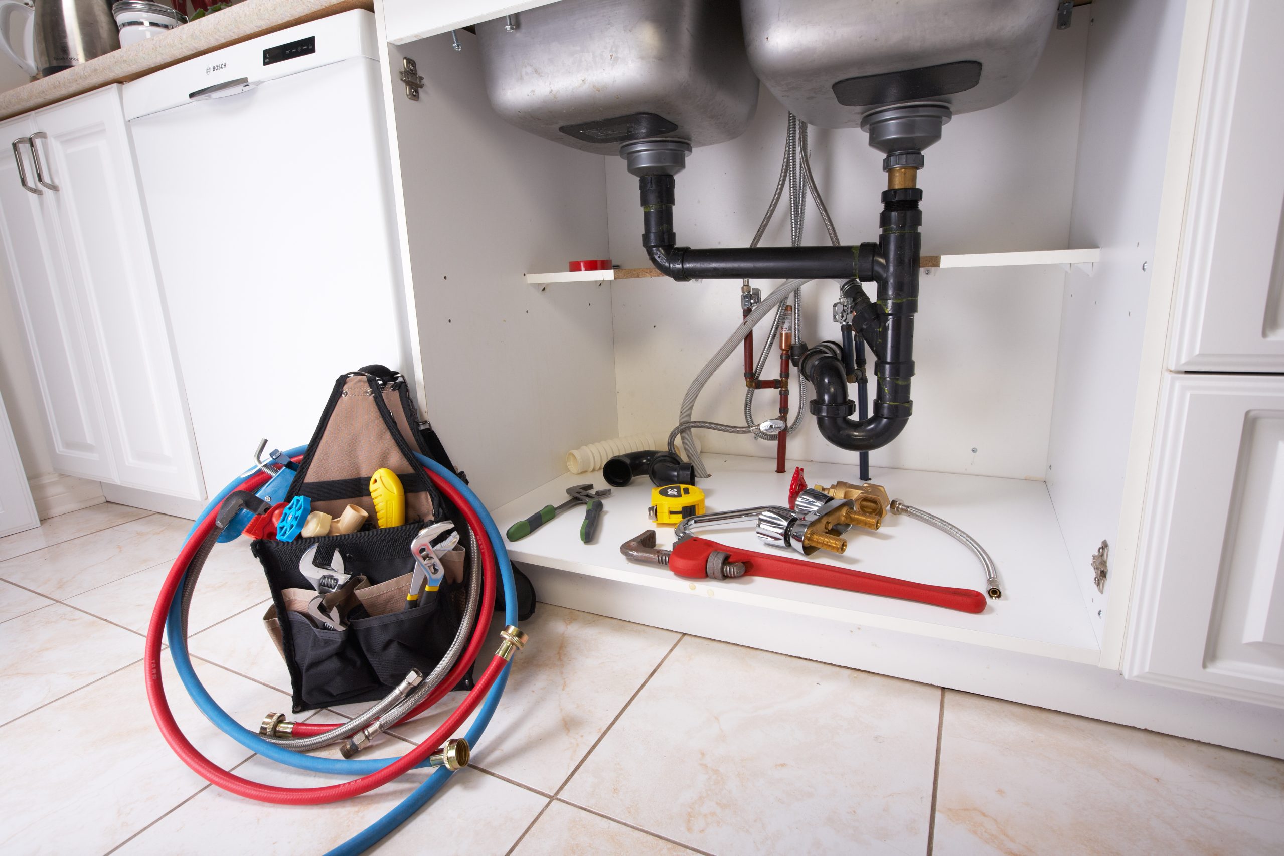 Plumbing tools on the kitchen.